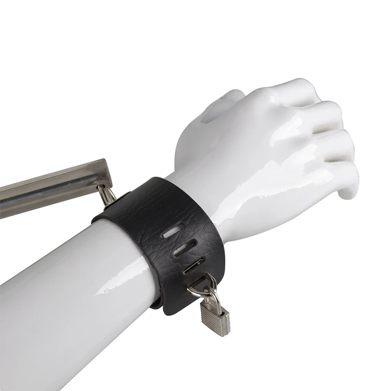 Barre de contrainte en métal avec attaches pour mains et pieds